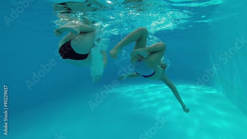 Swimming under the water.