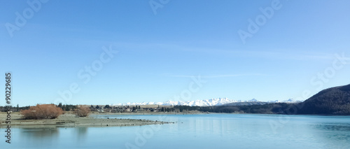 Lake with mountains covered with snow