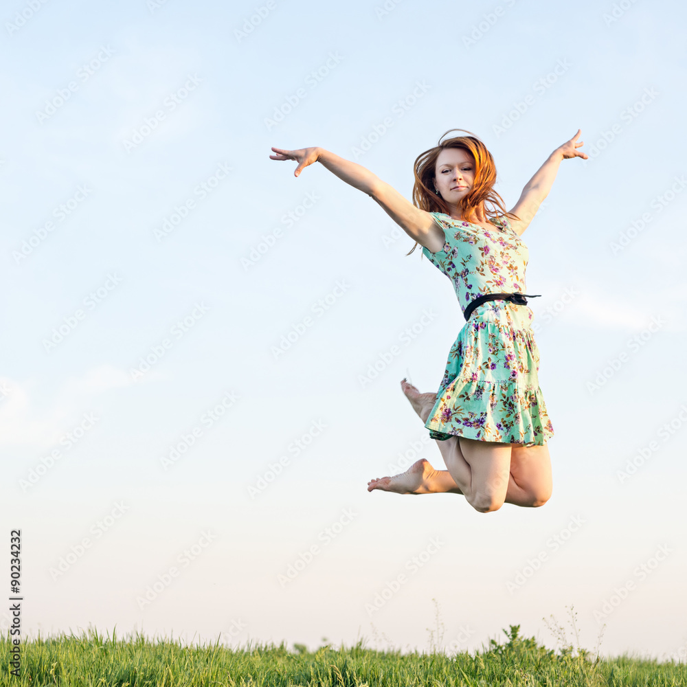 Happy Young Woman Jumping