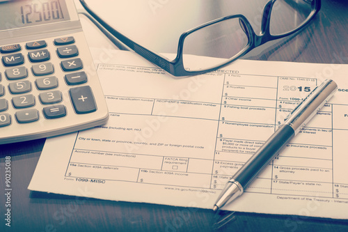 Miscellaneous income form on desk