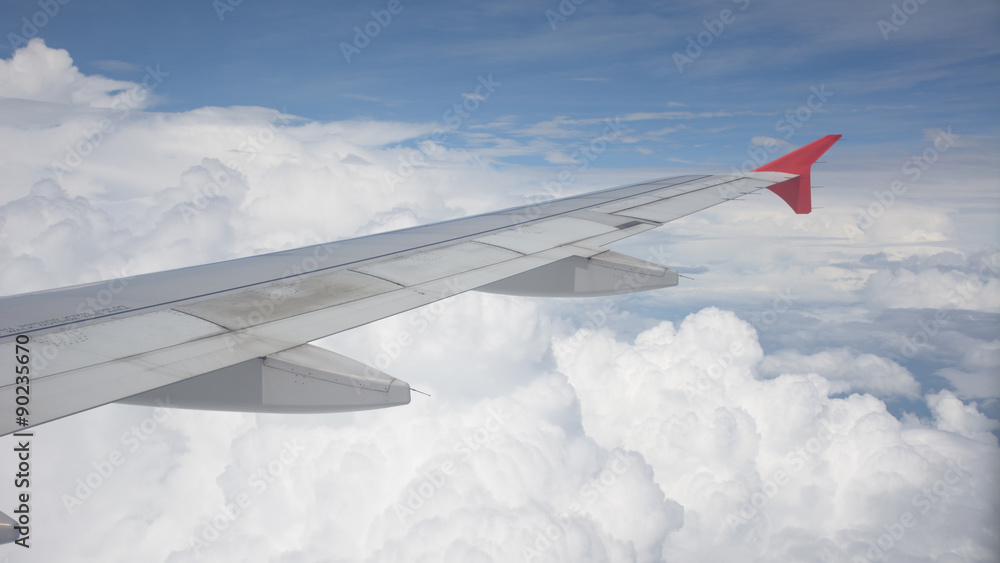 Fototapeta premium Wing view over blue sky
