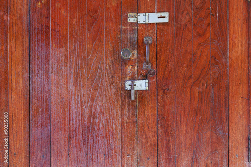 Old iron lock on doors © thirathat