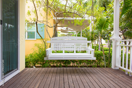Front porch with a porch swing photo