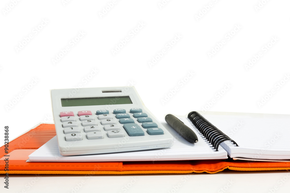 Isolated calculator, notebook and pen Isolated calculator, notebook and pen