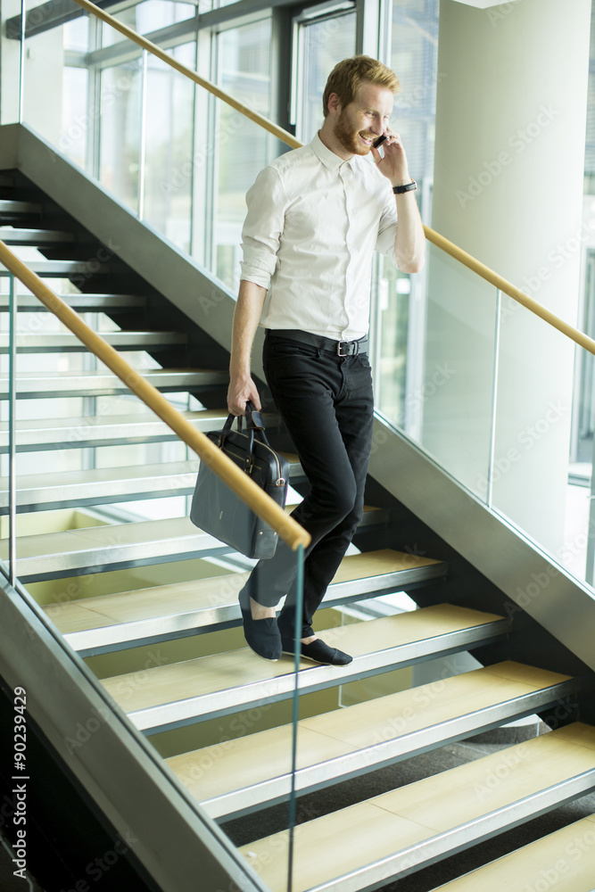 Young businessman on the stairs