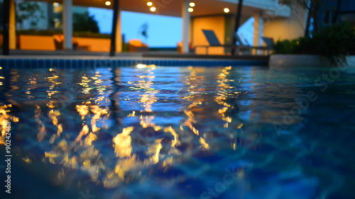 water surface of swimming pool at night in hotel