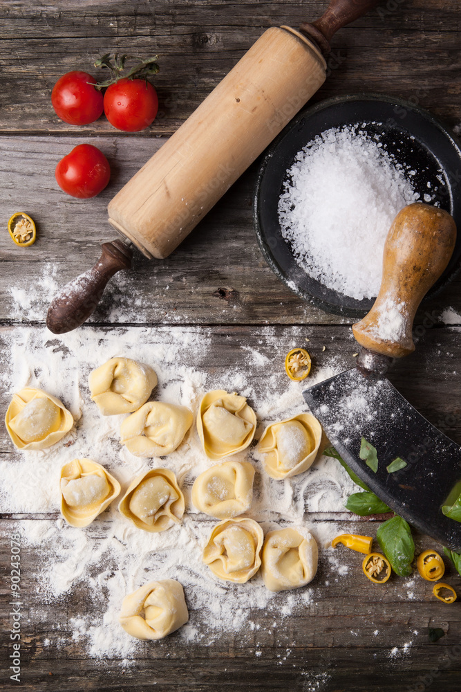 Fototapeta premium Pasta ravioli on flour