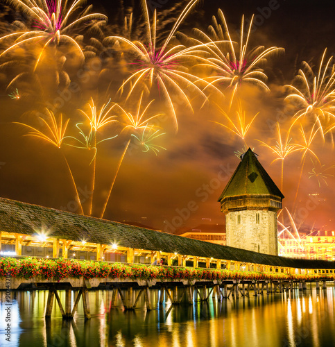 Fireworks over Chapel bridge in Lucerne, Switzerland 