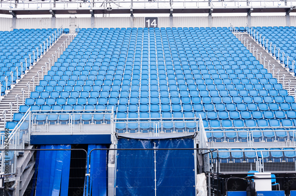 Fototapeta premium rows of blue seats in a stadium