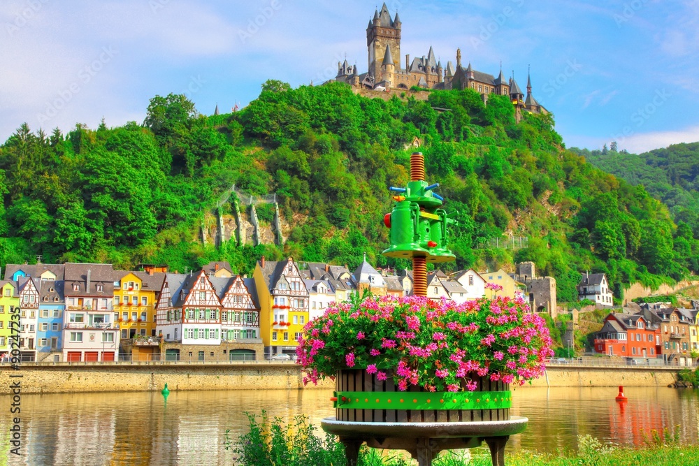 Old wine press in Cochem on the Moselle with imperial Castle in the background