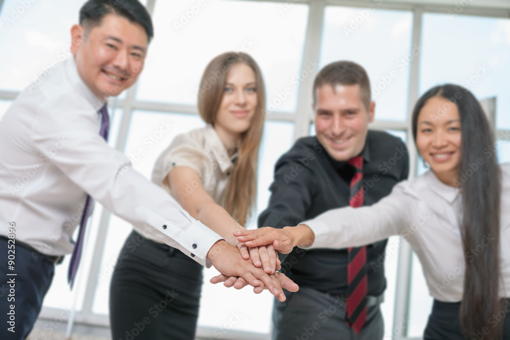 Multiracial successful business people with thumbs up gesture Multiracial successful business people with thumbs up gesture