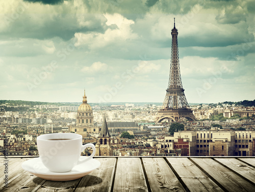 background with cup of coffee and Eiffel tower in Paris © Iakov Kalinin