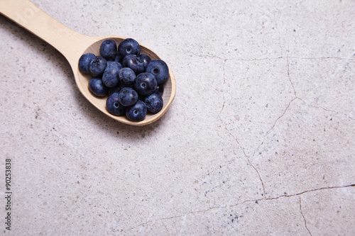 Wood spoon juicy ripe natural organic berries blueberries diet