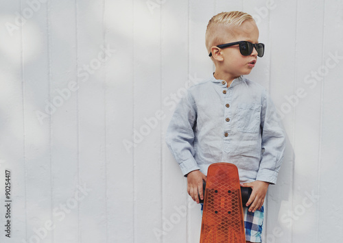 Cute little guy in big trendy sunglasses