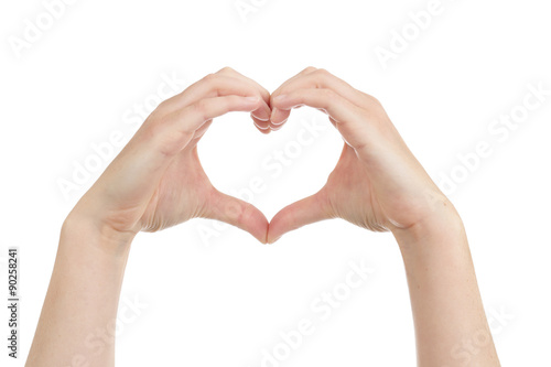 femme formant un coeur avec ses mains photo