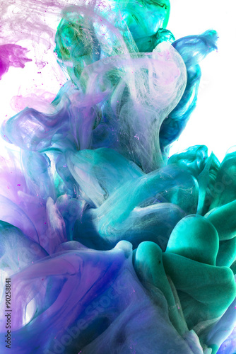 Colorful abstract composition with Liquids. Interesting shapes, patterns, rich textures, color mixing, fluidity. Space for text. White Background. Underwater ink color drop.