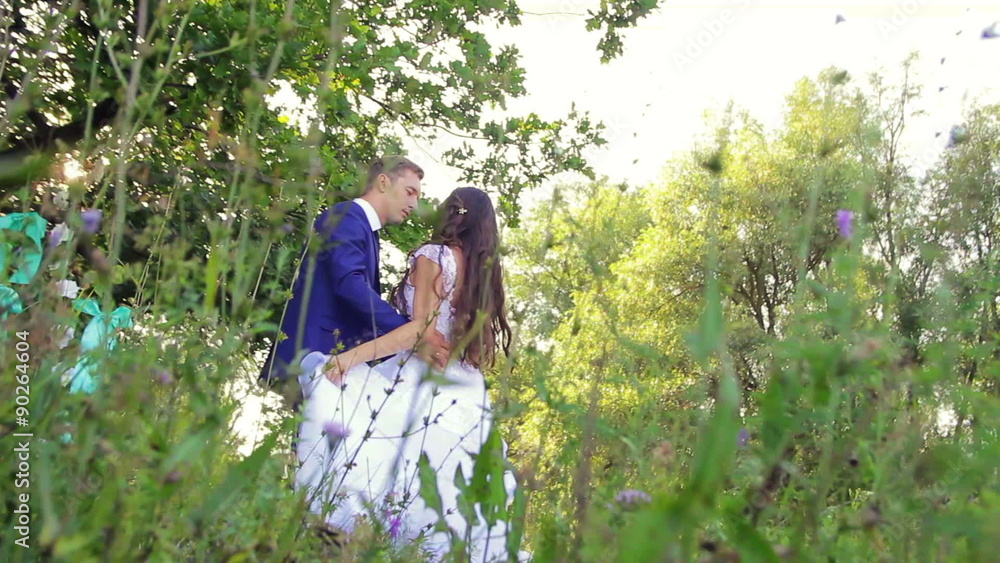 Beautiful young couple bride and groom sweet couple dancing and