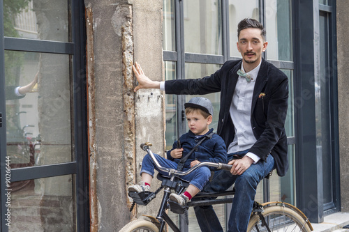 Father and son on the bicycle