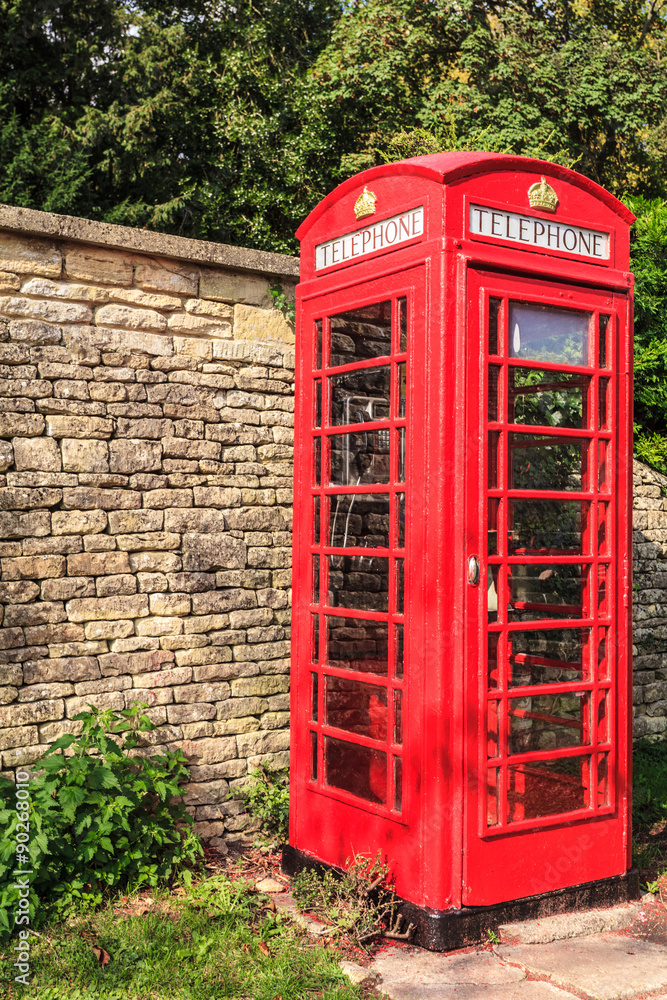 Traditional red telephone box in UK Traditional red telephone box in UK