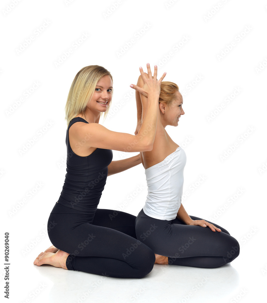 Doctor physiotherapist stretching a young sport woman