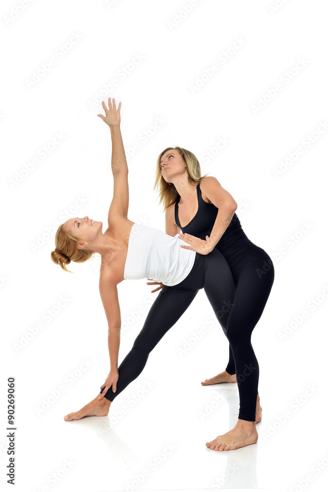 Doctor physiotherapist stretching a young sport woman Doctor physiotherapist stretching a young sport woman