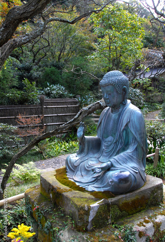 Buddha peaceful meditation in the garden 