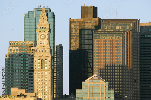 The Customs House Clock Tower and Boston skyline at sunrise, as seen from South Boston, Massachusetts, New England photo