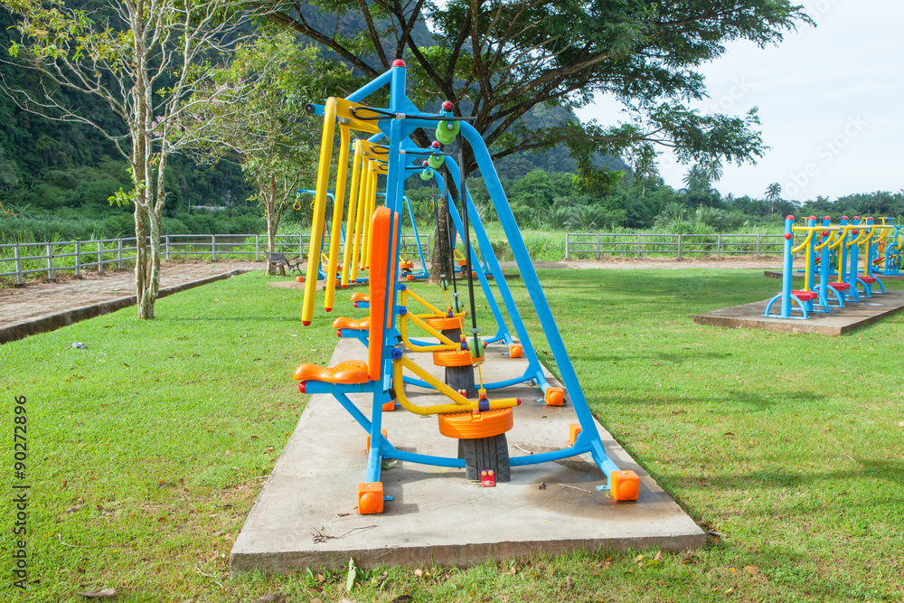 Fototapeta premium Exercise equipment in public park in the morning at Thailand