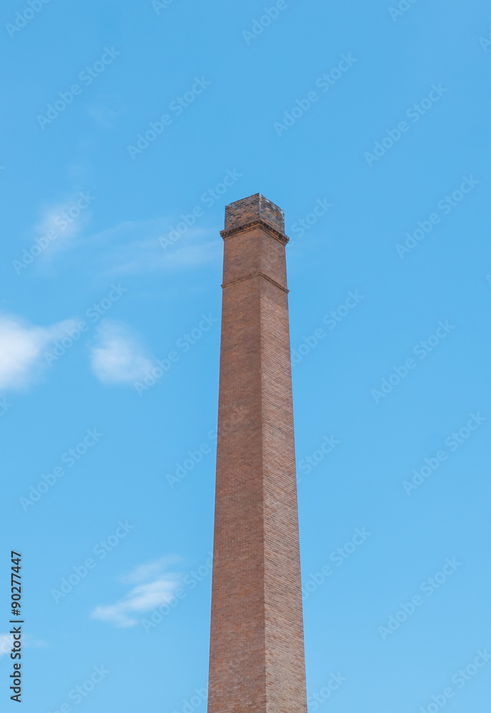 chimney and blue sky clouds vertical close up