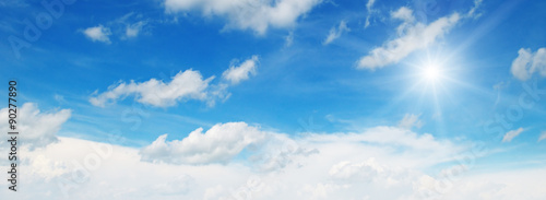 Fototapeta Naklejka Na Ścianę i Meble -  sun on blue sky with white clouds