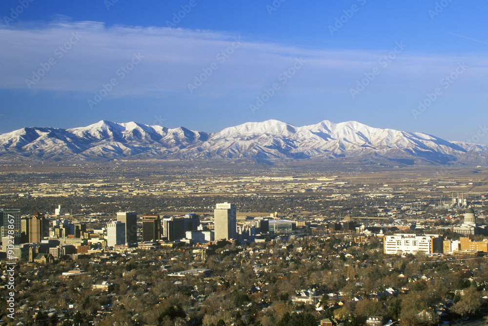 Skyline of Salt Lake City, UT with Snow capped Wasatch Mountains in background