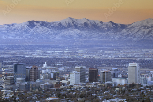 Skyline of Salt Lake City, UT with Snow capped Wasatch Mountains in background photo