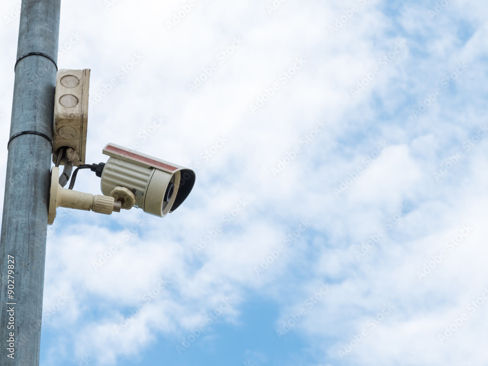 CCTV with blue sky clouds