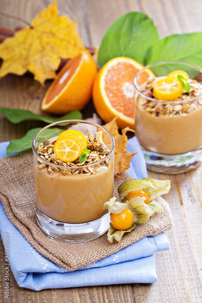 Pumpkin smoothie with granola on top Pumpkin smoothie with granola on top