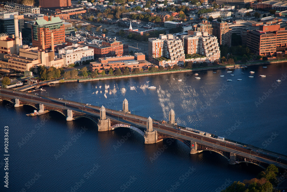 AERIAL morning view of Longfellow Arched Bridge over Charles River to Cambridge, Boston, MA.