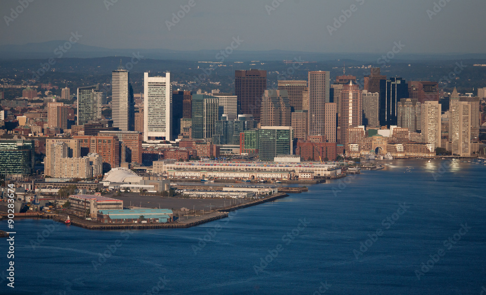 AERIAL morning view of Boston Skyline and Financial District and Wharf area, Boston, MA.