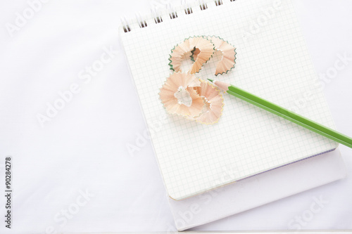 Ring binder book with pencil and pencil shavings