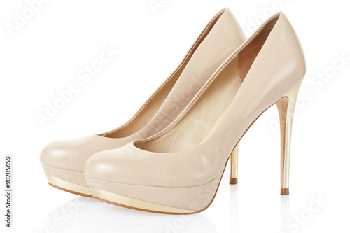 High heel beige shoes pair isolated on white, clipping path