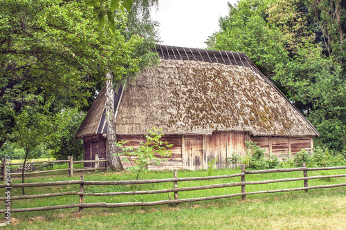 Ukrainian wooden barn Thatched locked uph