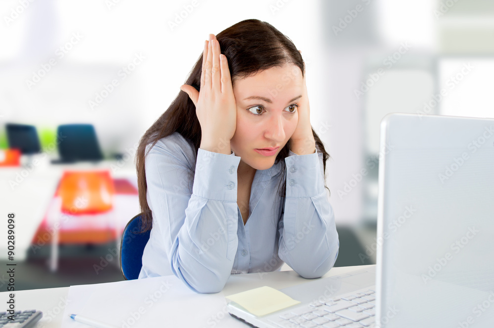 woman surprised in the office woman surprised in the office
