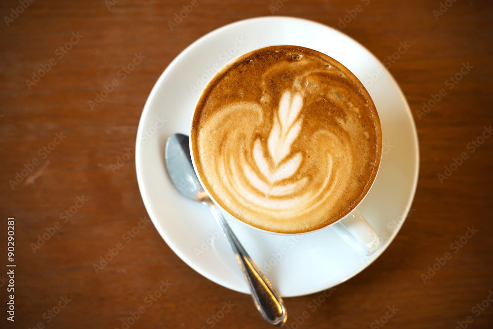 cup of coffee on table in cafe
