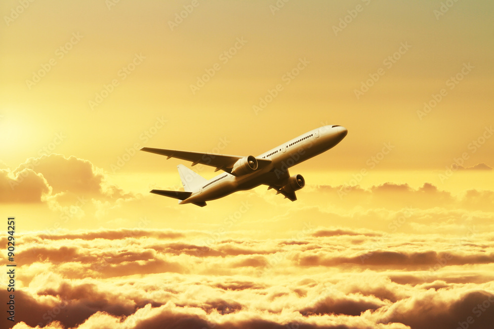 Airplane in the sky at sunset Airplane in the sky at sunset