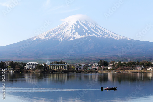 Mount Fuji in kawaguchiko lake and fishing boat.