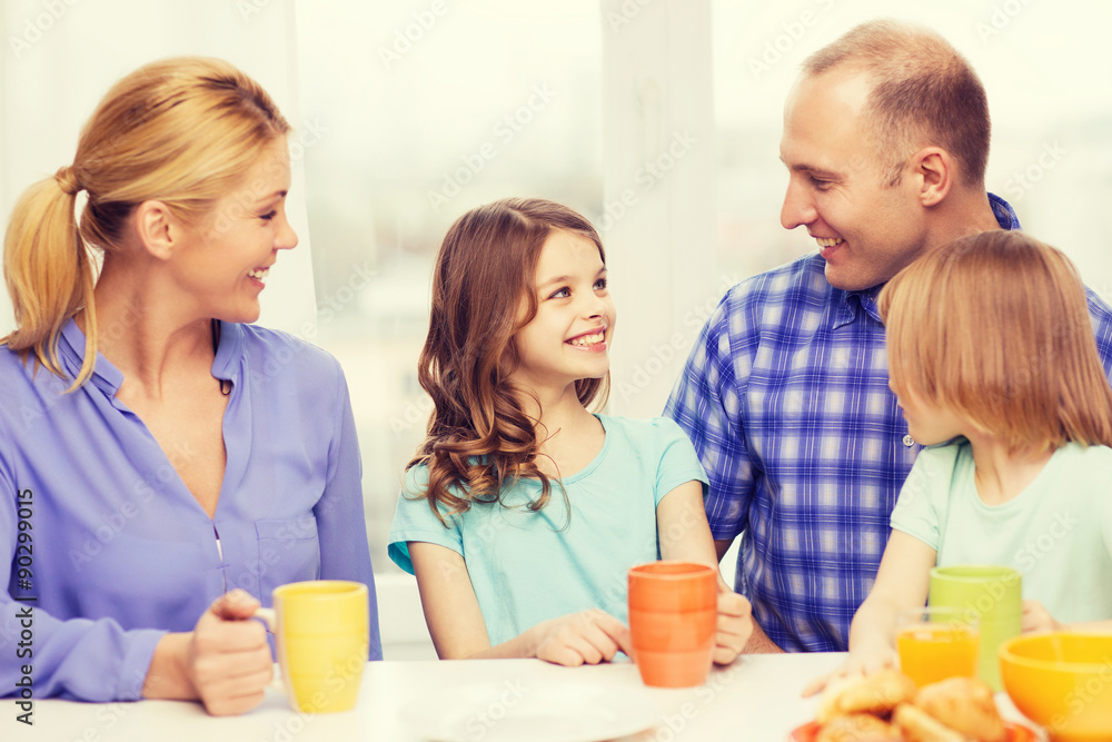 happy family with two kids with having breakfast happy family with two kids with having breakfast
