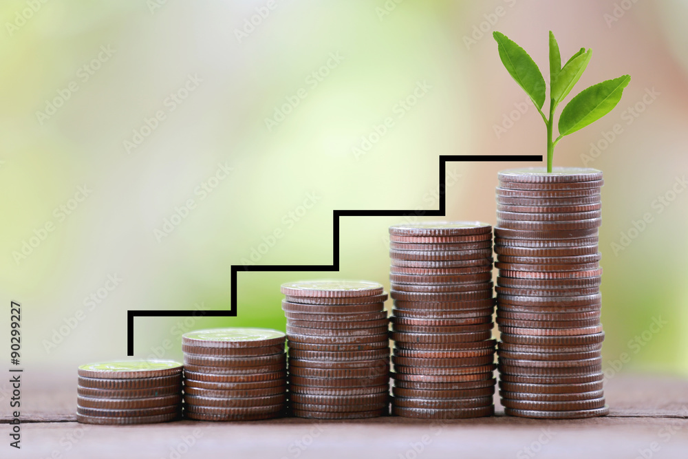 silver coin stack and arrow line in business growth concept on w silver coin stack and arrow line in business growth concept on w