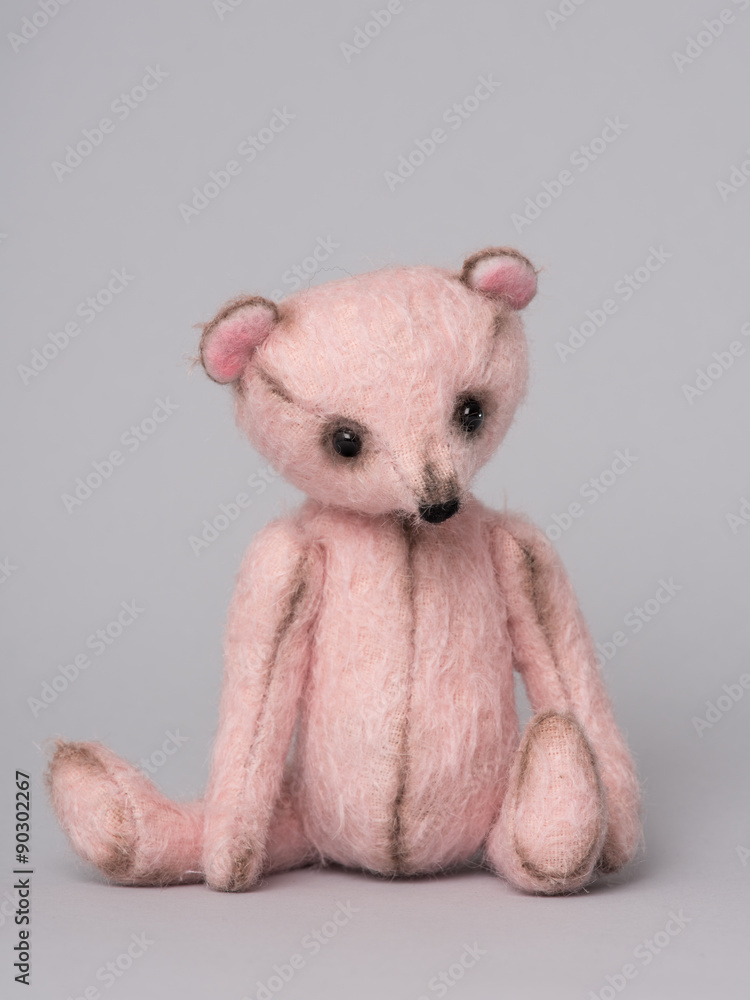 grey and pink teddy bear