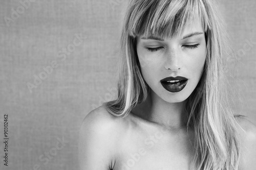 Passionate young woman in black and white