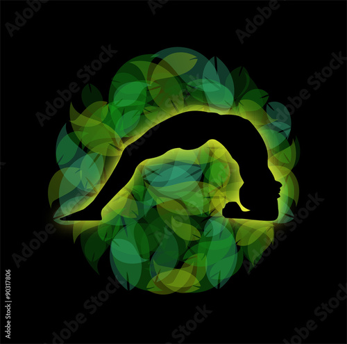 Person in a yoga pose on green leaves