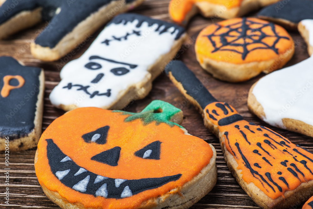 Handmade Halloween cookies on a wooden table Handmade Halloween cookies on a wooden table