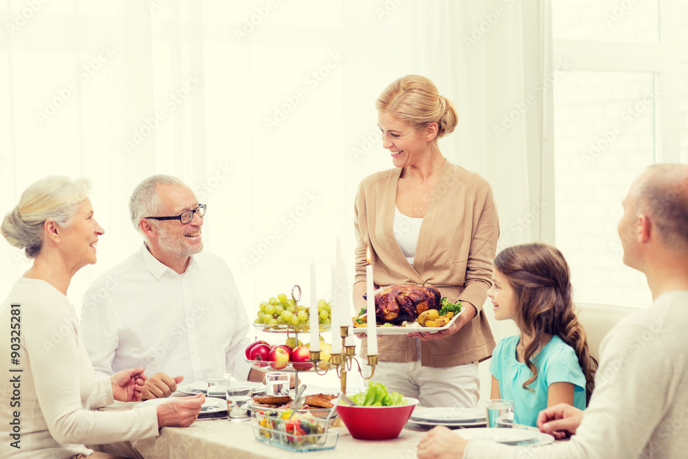 smiling family having holiday dinner at home smiling family having holiday dinner at home